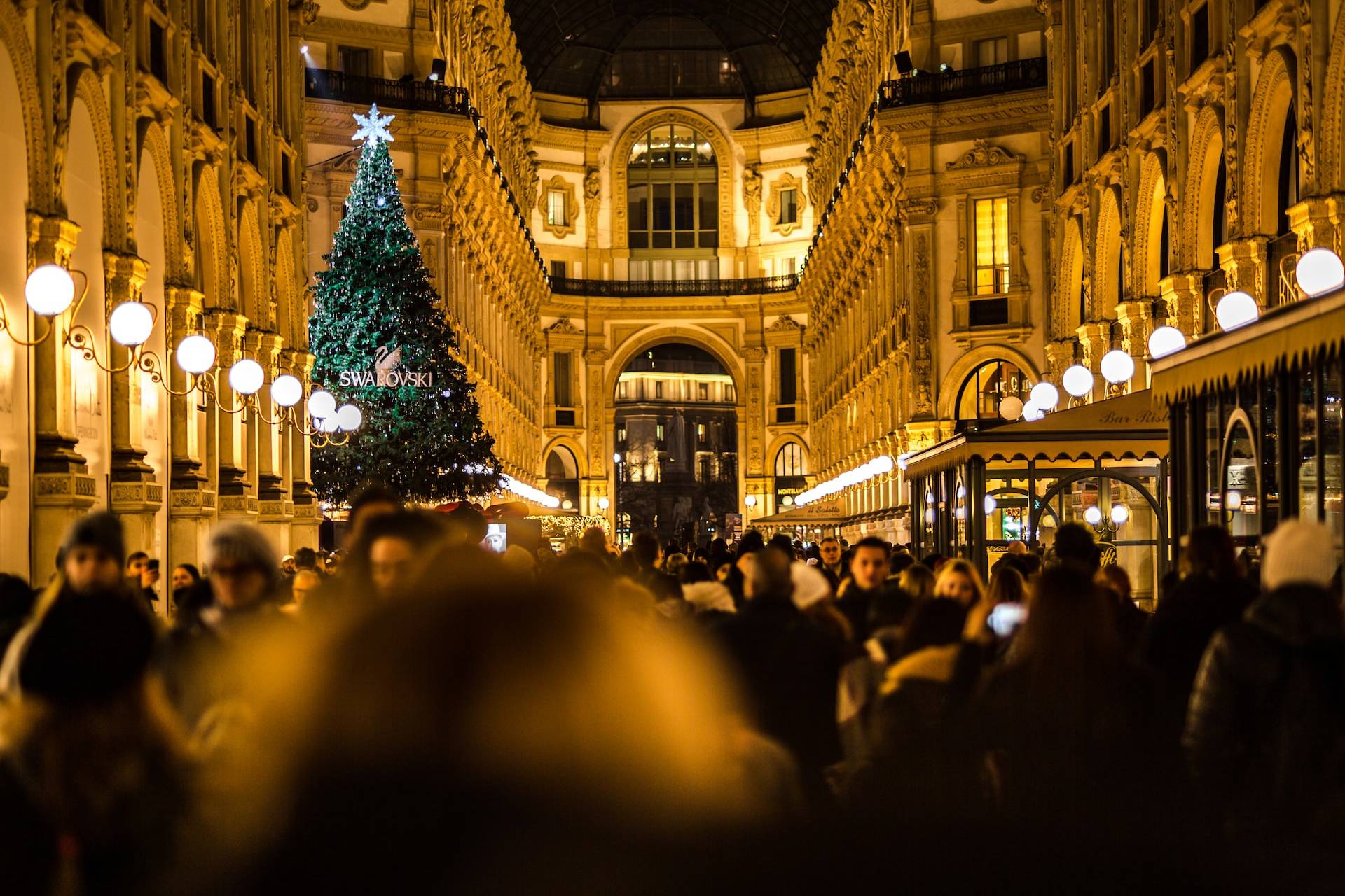 man and woman passing on cathedral