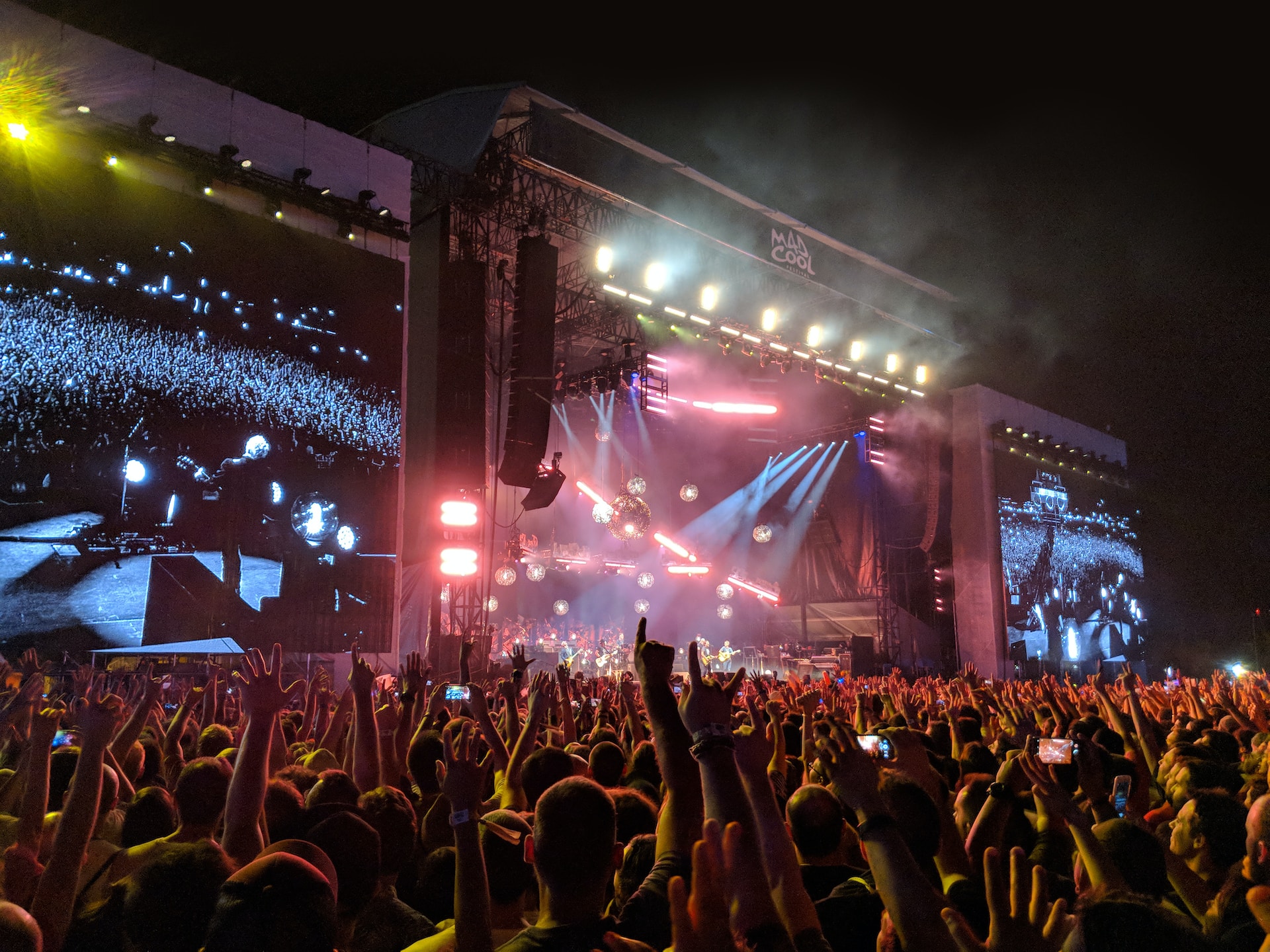 people watching an event during night time