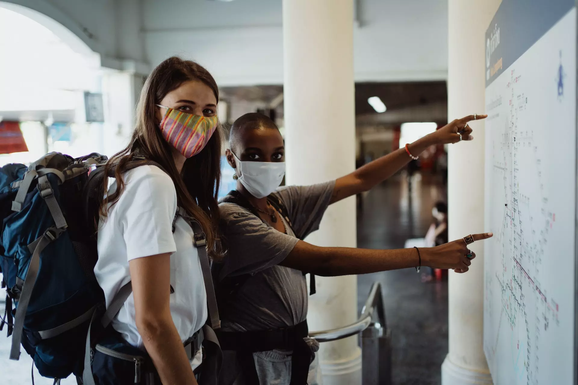 Two Women with Face Mask Looking at Camera